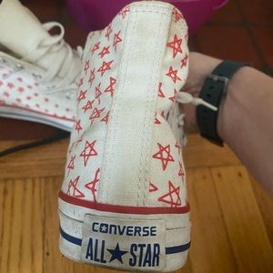Converse youth size 4y red white and blue with red stars on it